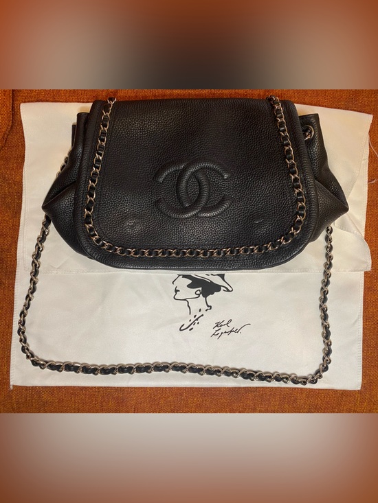CHANEL Handbags - CHANEL Black Embossed CC Logo Leather Organizer Pouch